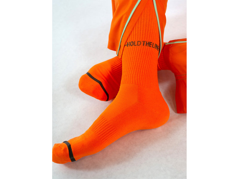 HOLD THE LINE <br> ORANGE <br> MID-CALF ATHLETIC